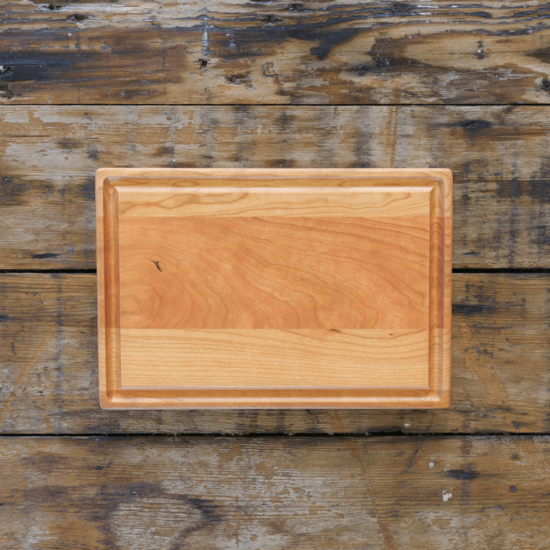 Cherry wood rectangular cutting board, 11 by 7 inches, one of six board choices in the kit
